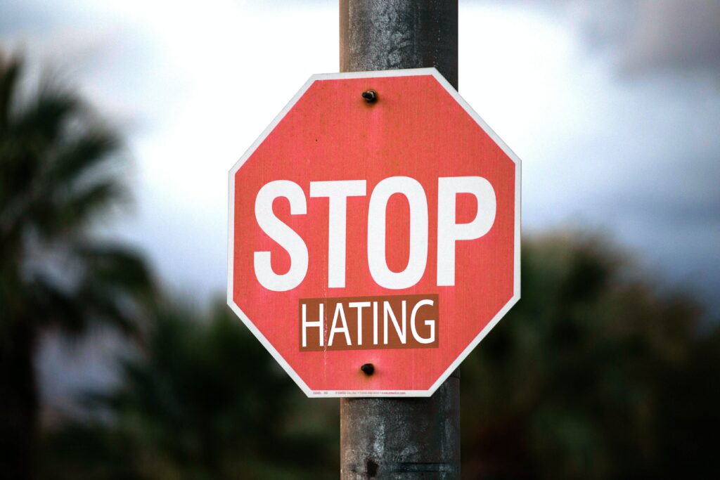A stop signal saying Stop Hating