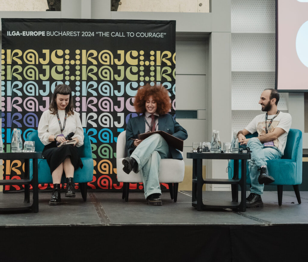 A photo of the Conference reporters on stage